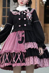 Rosa/schwarzes süßes Lolita JSK Kleid mit Vintage-Nähten und Erdbeermuster
